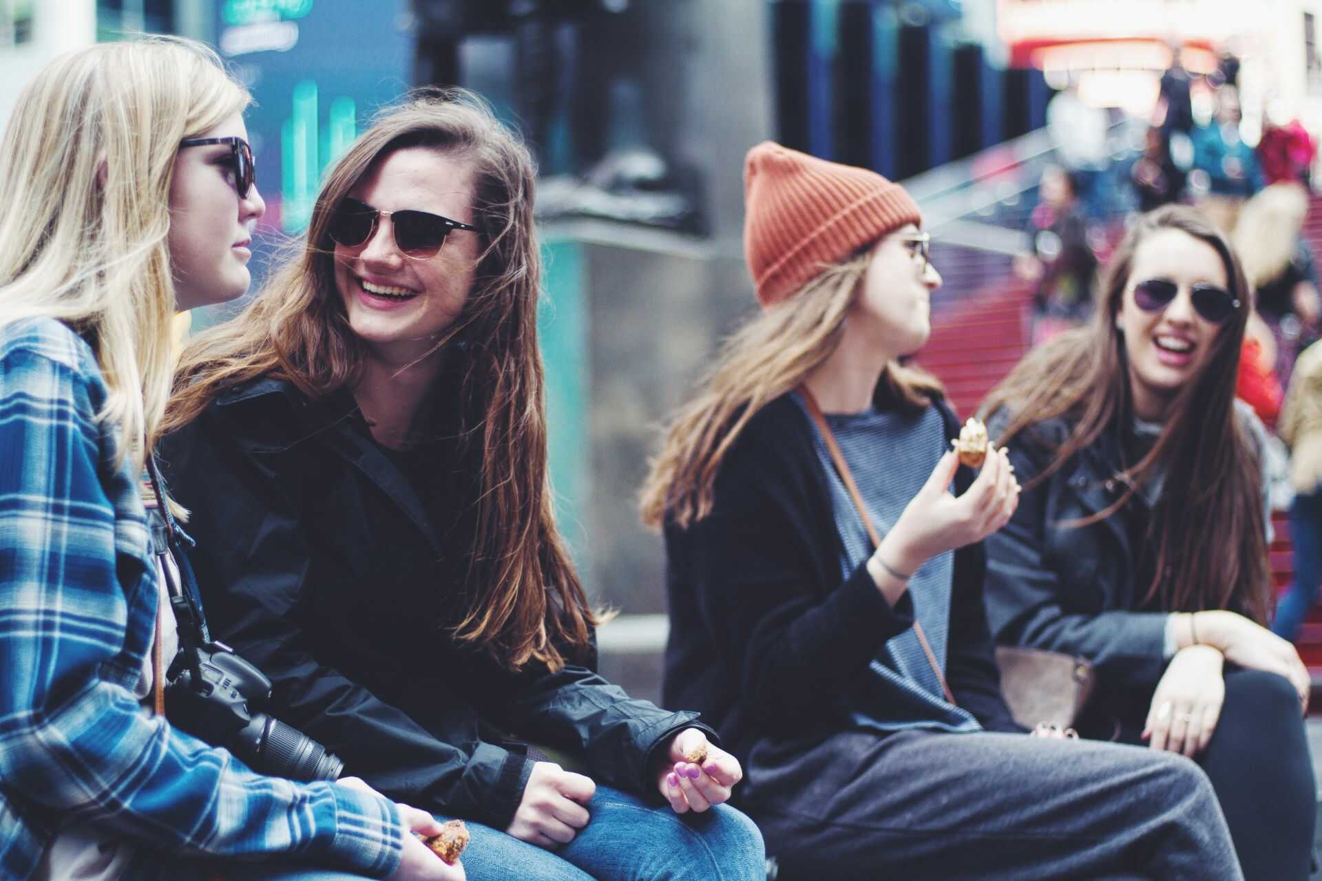 group of girlfriends laughing outside